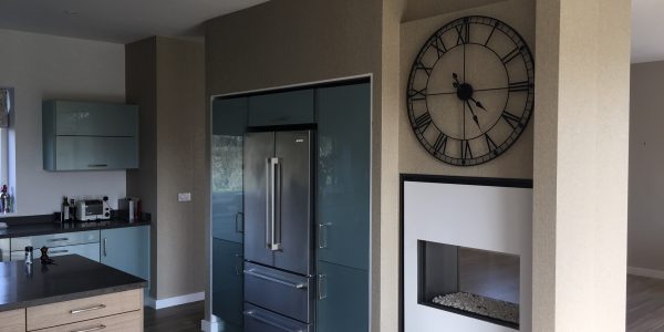 wallpaper around cabinets