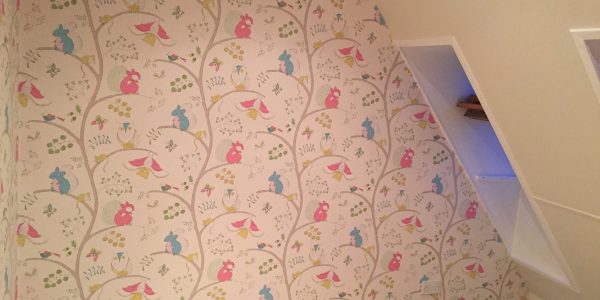 wallpapering in the attic