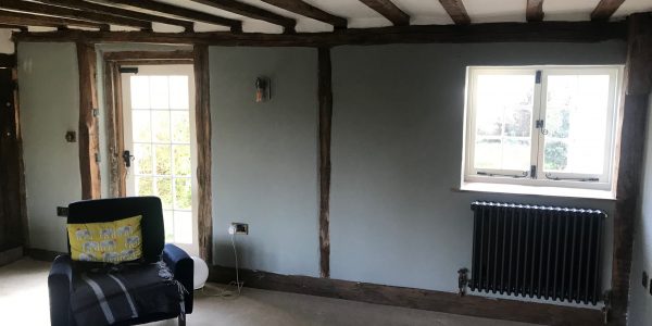 small room with blue painted walls
