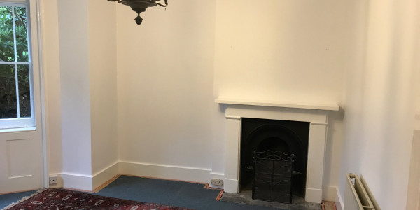fire place with white walls
