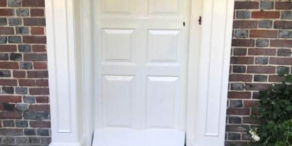 White front door with white frame