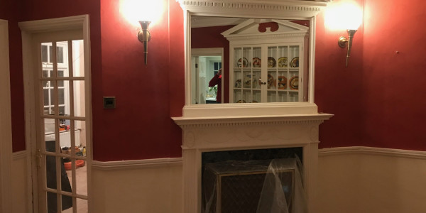 Before 2 fireplace with mirror above