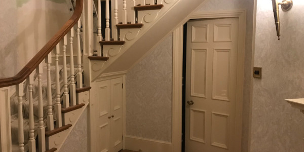 Wallpapering projects 1 door under the stairs